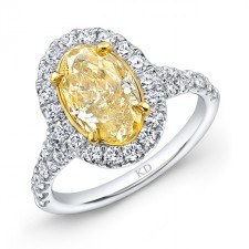 WHITE AND YELLOW GOLD FANCY YELLOW OVAL DIAMOND ENGAGEMENT RING