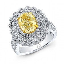 WHITE AND YELLOW GOLD VINTAGE FANCY YELLOW DIAMOND ENGAGEMENT RING